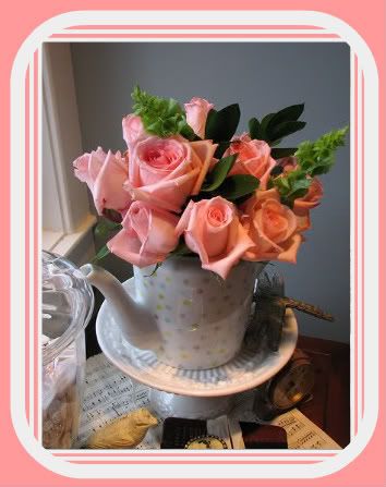 roses in teapot